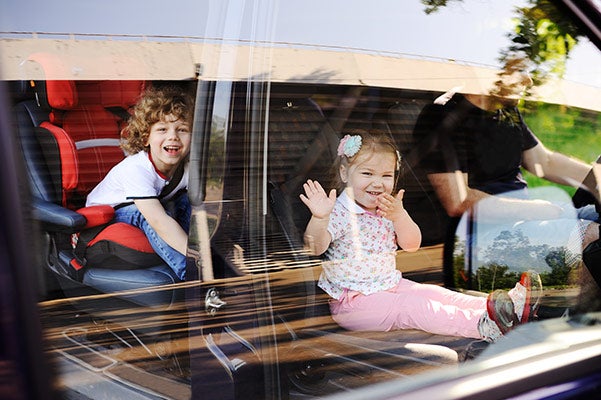 image of a family in a minivan